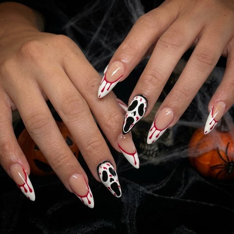 DIY Halloween Nails Bloody French Tips with a Ghost Face Accent 👻 - finished nail art design